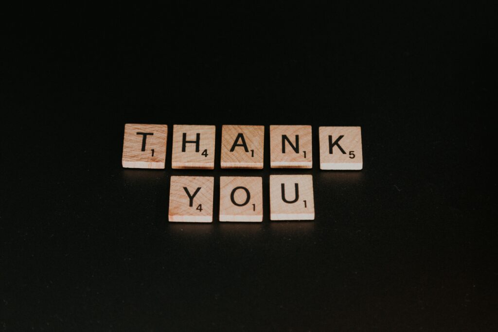 Scrabble game image of text saying thank you